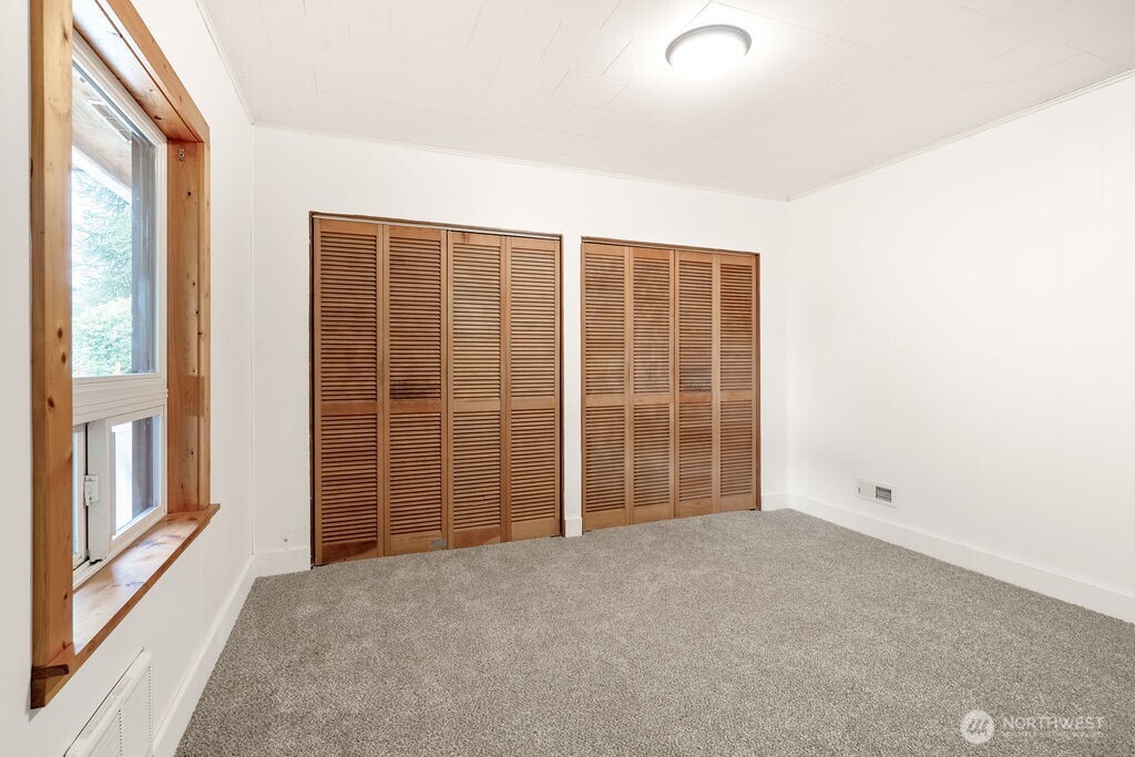 7302 Blaine Road Aberdeen, WA 98520 - Photo 12 of 38 a view of an empty room with a window