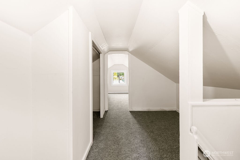 7302 Blaine Road Aberdeen, WA 98520 - Photo 16 of 38 a view of a hallway with staircase