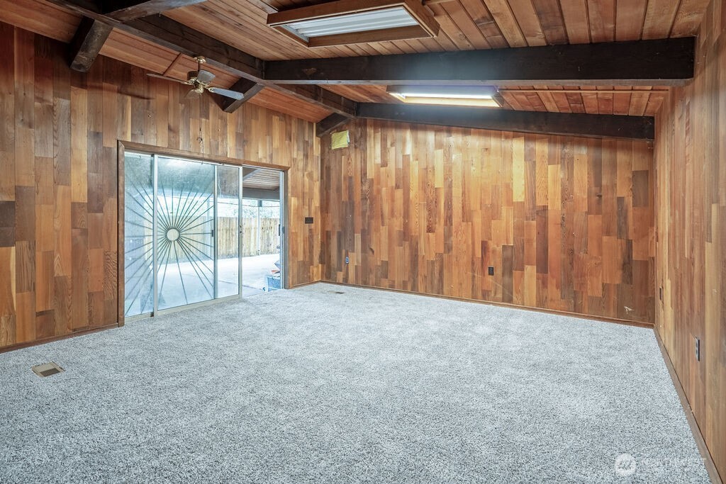 7302 Blaine Road Aberdeen, WA 98520 - Photo 25 of 38 a view of empty room with wooden floor and fan