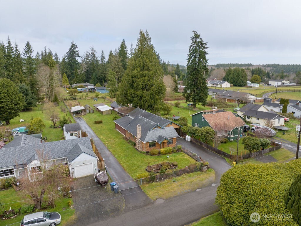 7302 Blaine Road Aberdeen, WA 98520 - Photo 28 of 38 an aerial view of a house with a garden