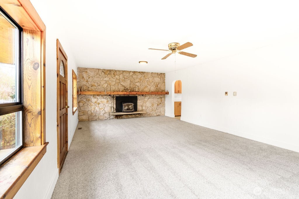 7302 Blaine Road Aberdeen, WA 98520 - Photo 3 of 38 a view of empty room with a fireplace