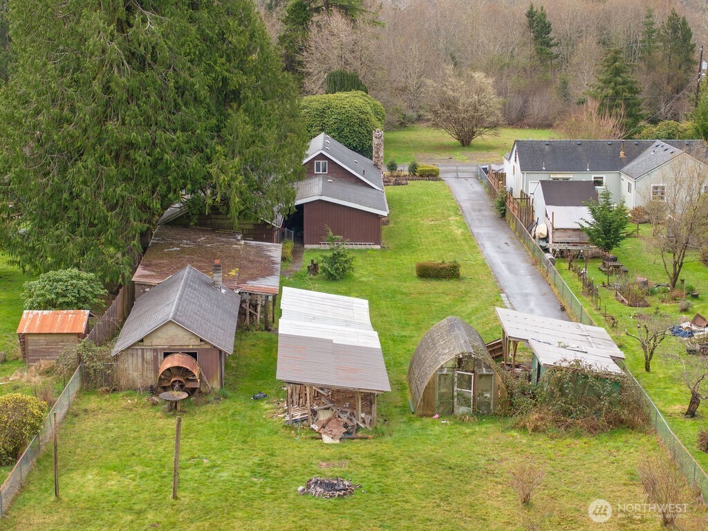 7302 Blaine Road Aberdeen, WA 98520 - Photo 31 of 38 an aerial view of a house with swimming pool and garden