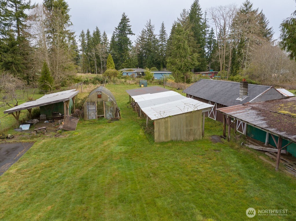 7302 Blaine Road Aberdeen, WA 98520 - Photo 33 of 38 a view of a house with pool and a yard