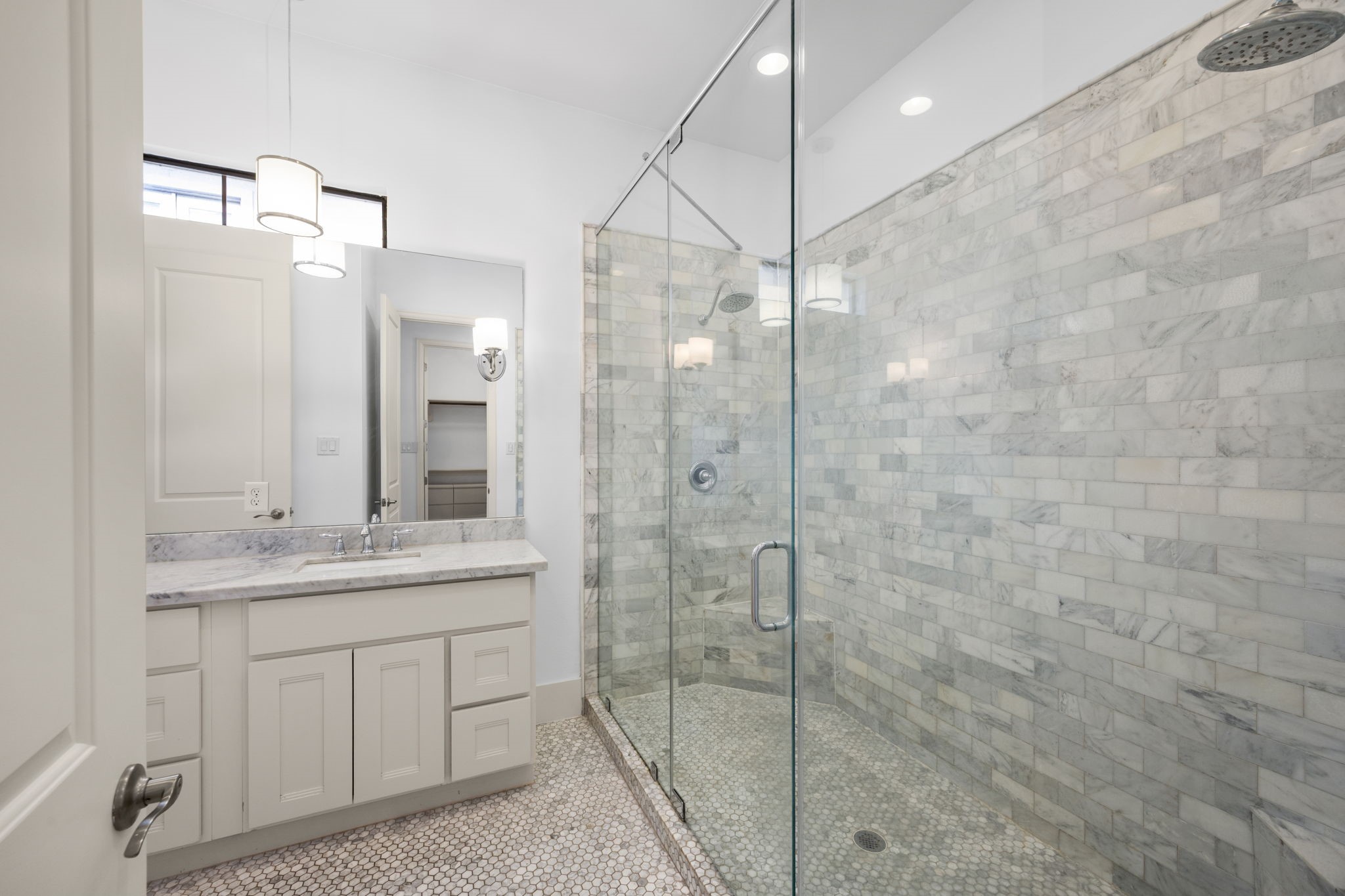 4512 Inker Street, Unit A Houston, TX 77007 - Photo 29 of 39 Second Floor: Primary bathroom with Carrara marble.