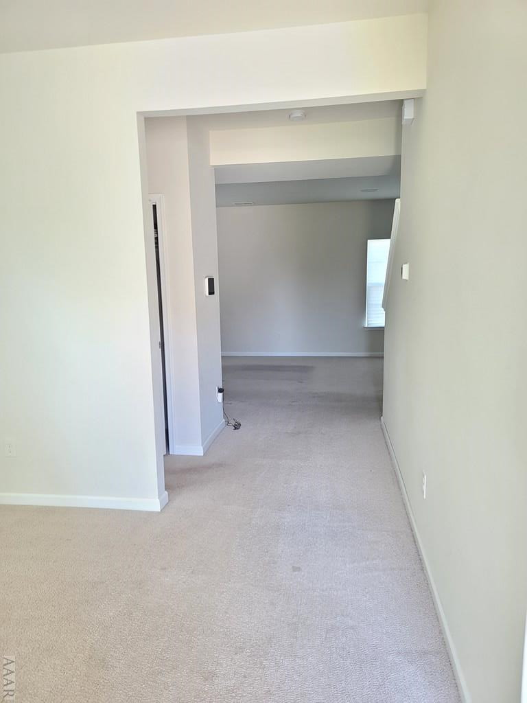 105 Green Lake Road Moyock, NC 27958 - Photo 3 of 23 Hallway to living room/kitchen