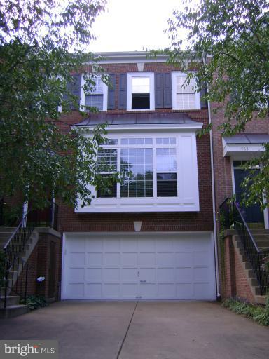 1967 Logan Manor Drive Reston, VA 20190 - Photo 23 of 30 a red brick building with many windows