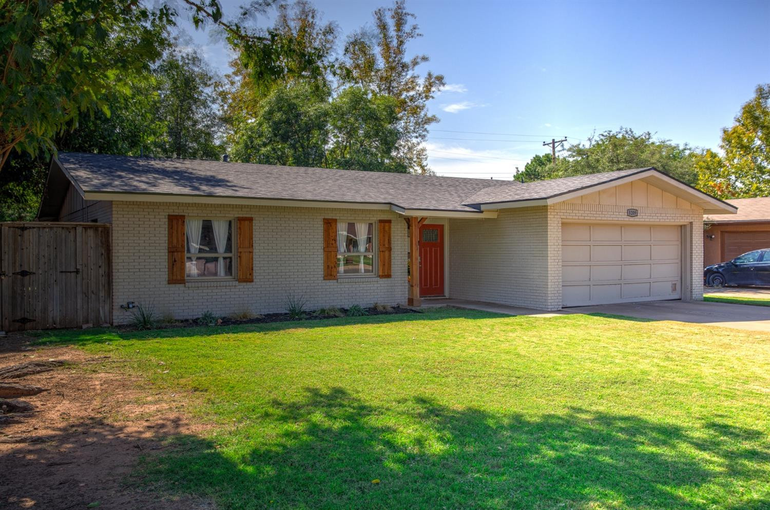 5209 16th Street Lubbock, TX 79416 - Photo 2 of 23 a house with a yard