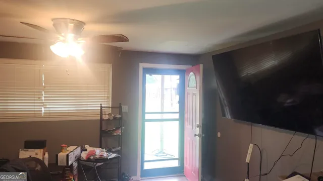 a view of a livingroom with furniture