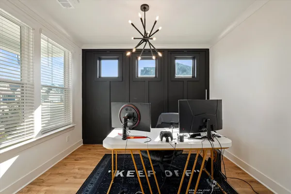 a view of a workspace with furniture