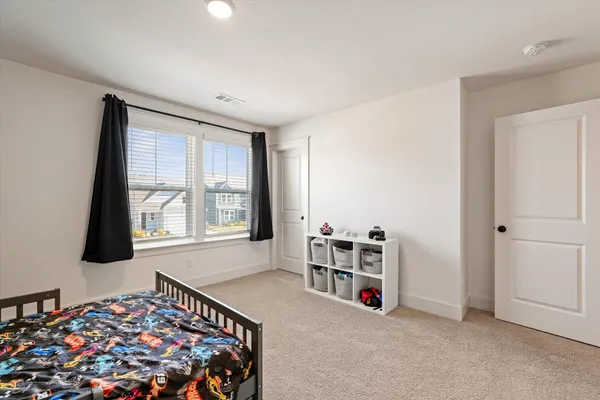 a very nice looking room with a big bed