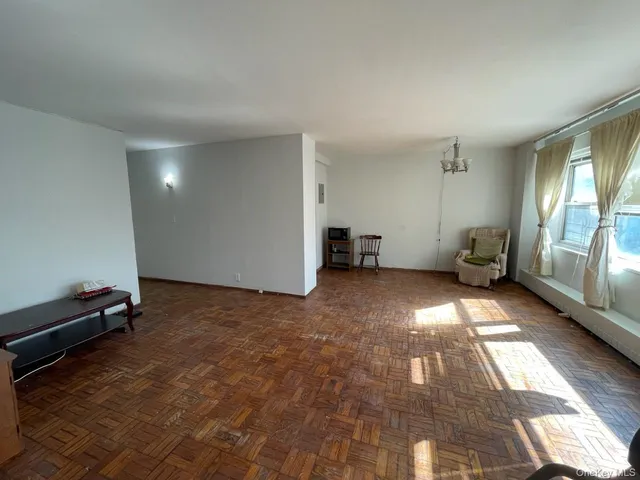 a view of empty room with a couch