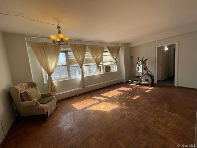 a view of livingroom with furniture and windows