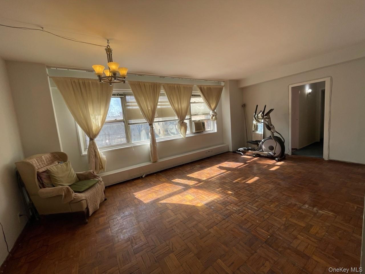 3 Fordham Hill Ovl, Unit 4G Bronx, NY 10468 - Photo 6 of 14 a view of livingroom with furniture and windows