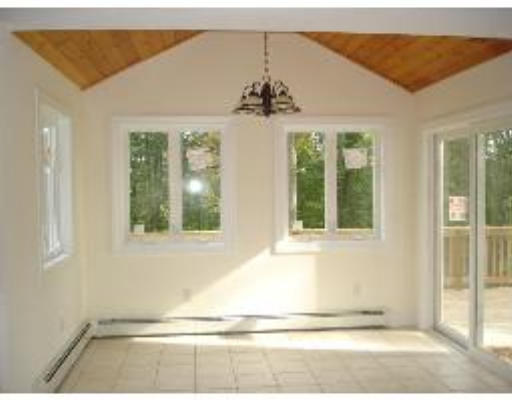 Lot 5 Bemis Road Warren, MA 01083 - Photo 5 of 6 an empty room with a ceiling fan and window