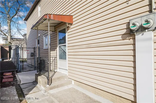 a view of a door of a house with a door