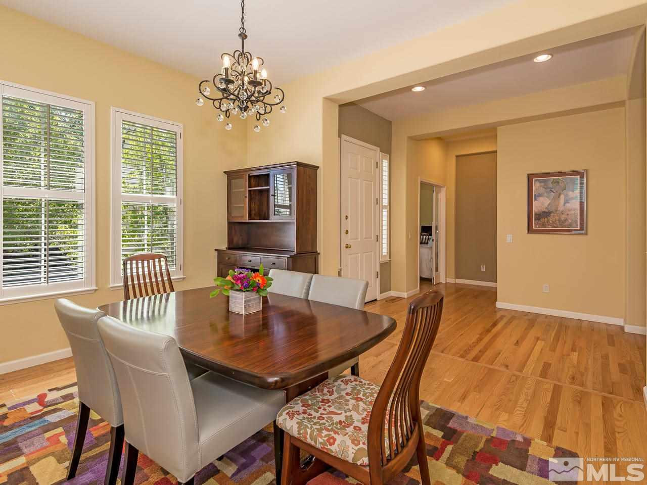 1755 Caughlin Creek Road Reno, NV 89519 - Photo 4 of 25 a view of a dining room with furniture window and outside view