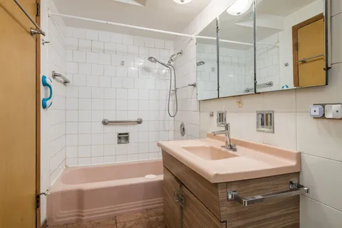 a bathroom with a sink and a bathtub