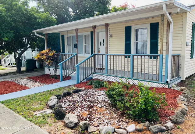 a front view of a house having patio