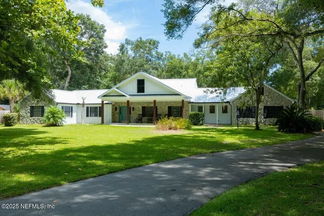 a view of a house with a big yard