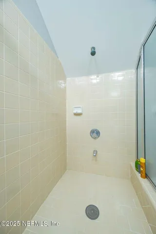 a view of a balcony with wooden floor