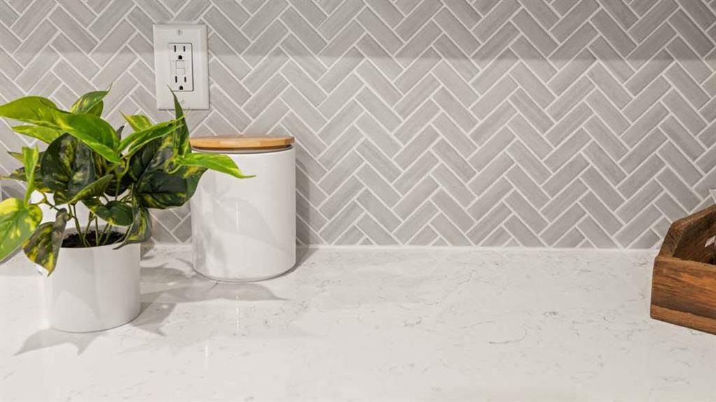 424 Reflection Drive Stockbridge, GA 30281 - Photo 19 of 66 a white vase with white and yellow flowers