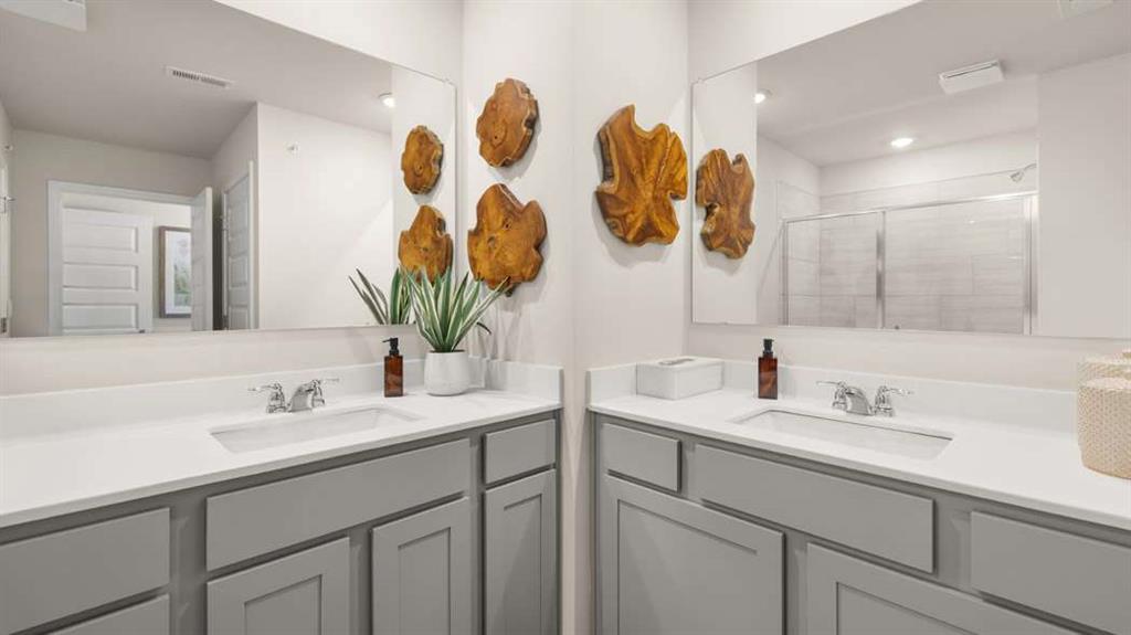424 Reflection Drive Stockbridge, GA 30281 - Photo 37 of 66 a bathroom with a sink and a mirror