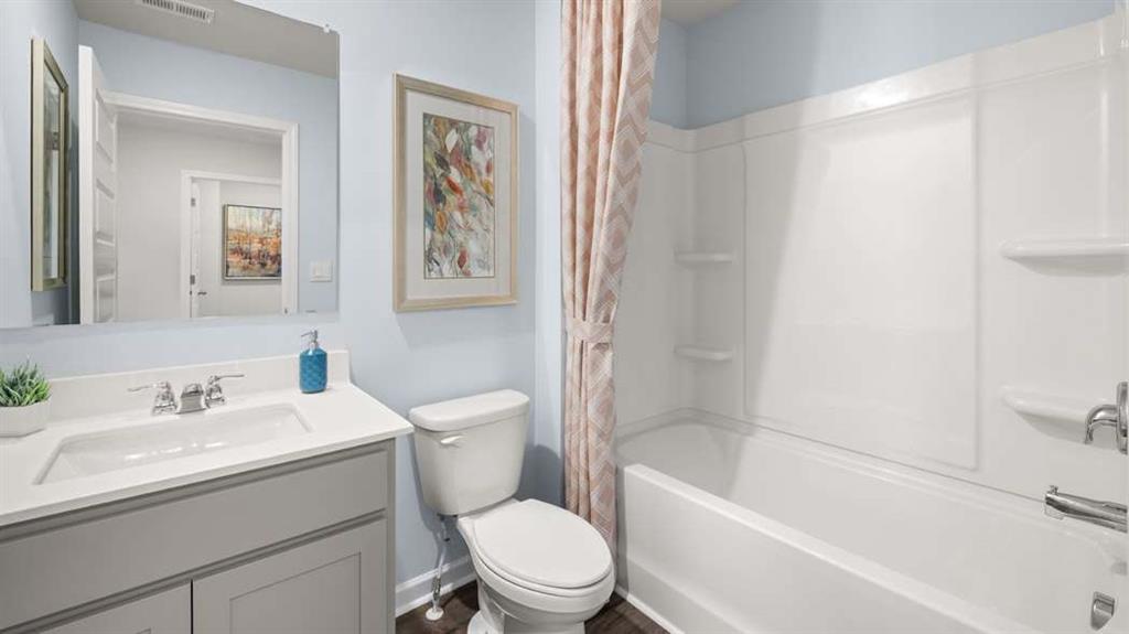 424 Reflection Drive Stockbridge, GA 30281 - Photo 56 of 66 a bathroom with a sink toilet and a bathtub