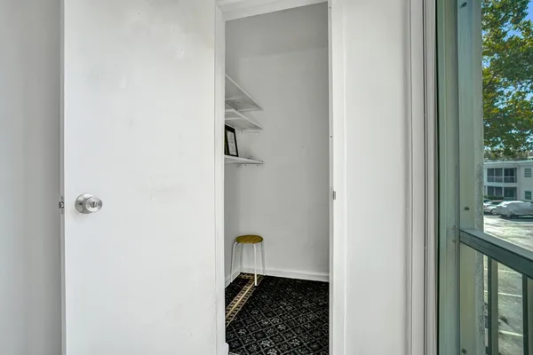 a view of a deck with a yard