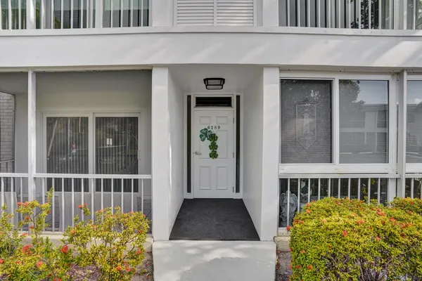 a car parked in front of a house