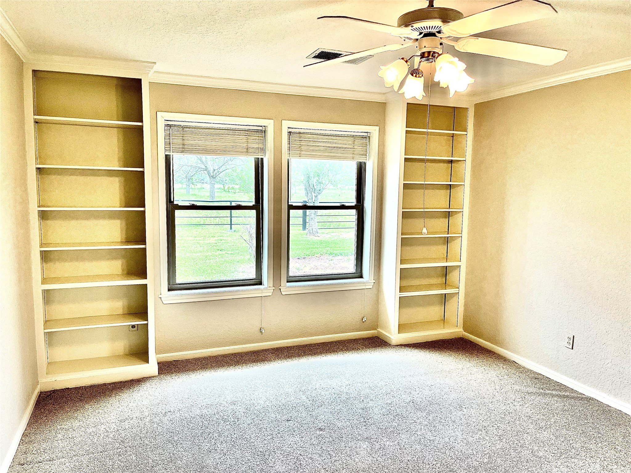 37243 FM 521 Road Bay City, TX 77414 - Photo 22 of 50 View from the 3rd bedroom looking out towards the front of the property.
