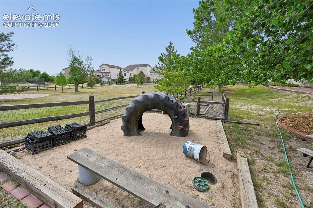 12571 Scamper Road Peyton, CO 80831 - Photo 47 of 49 Backyard sand box