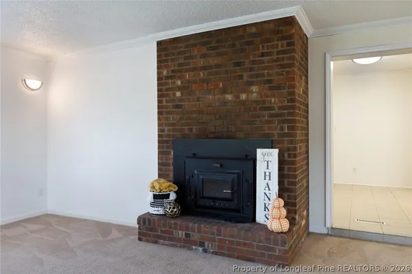 a living room with a fireplace