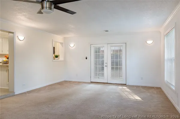 an empty room with windows