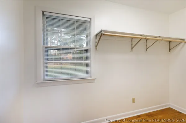 a view of a room that has a window in it