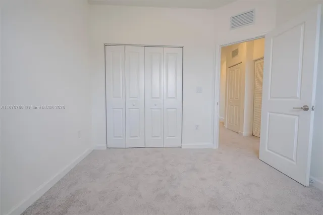 an empty room with closet