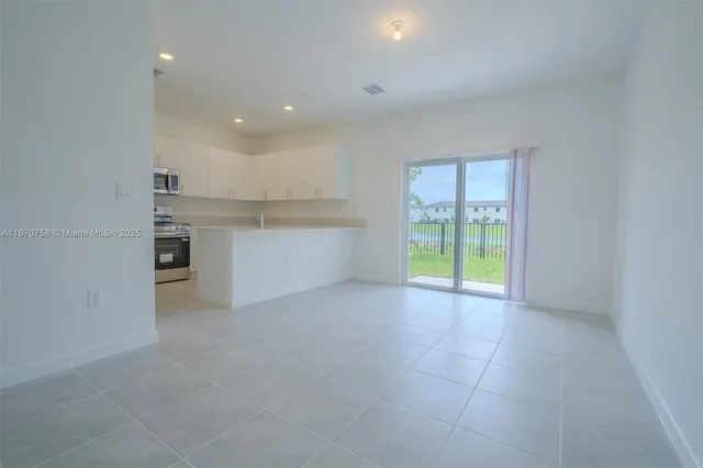 a plant is in front of a door