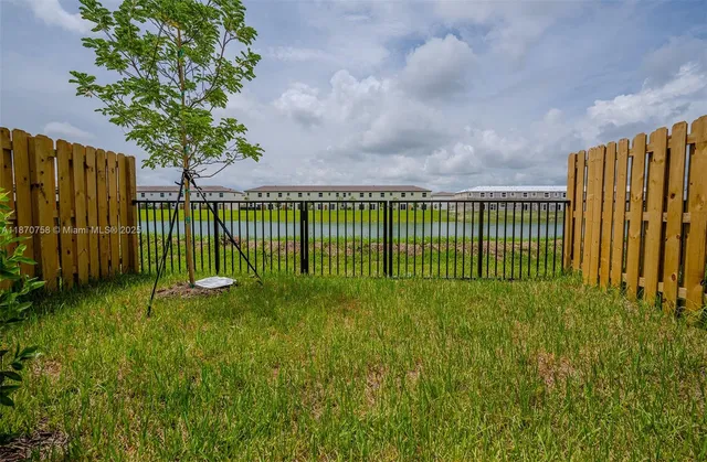 a view of outdoor space kitchen and microwave