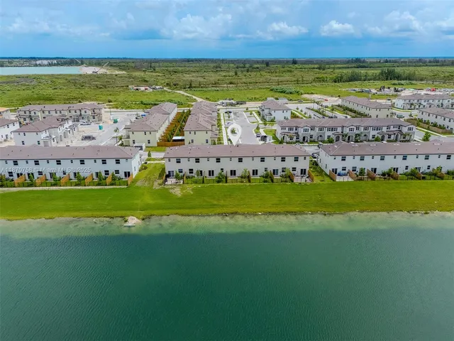 a view of a city with an ocean