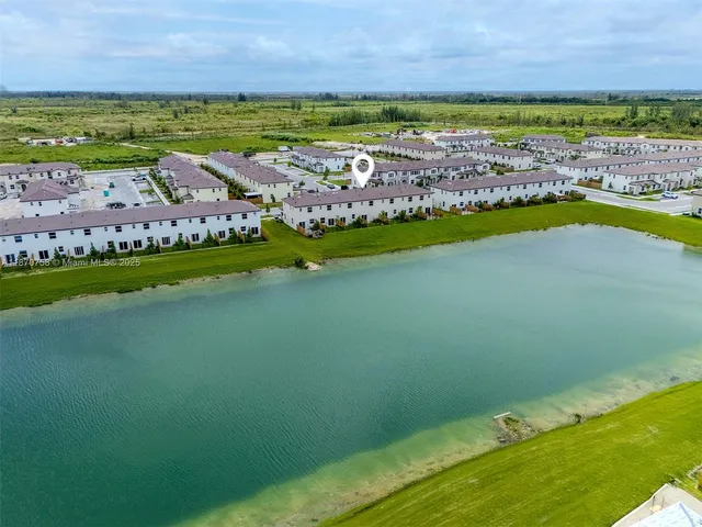 a view of an ocean with a city view