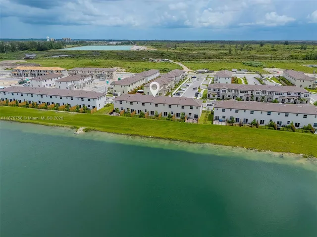 a view of a city with an ocean