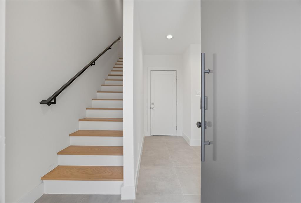 4517 Munger Avenue, Unit 101 Dallas, TX 75204 - Photo 38 of 39 a view of entryway with wooden floor