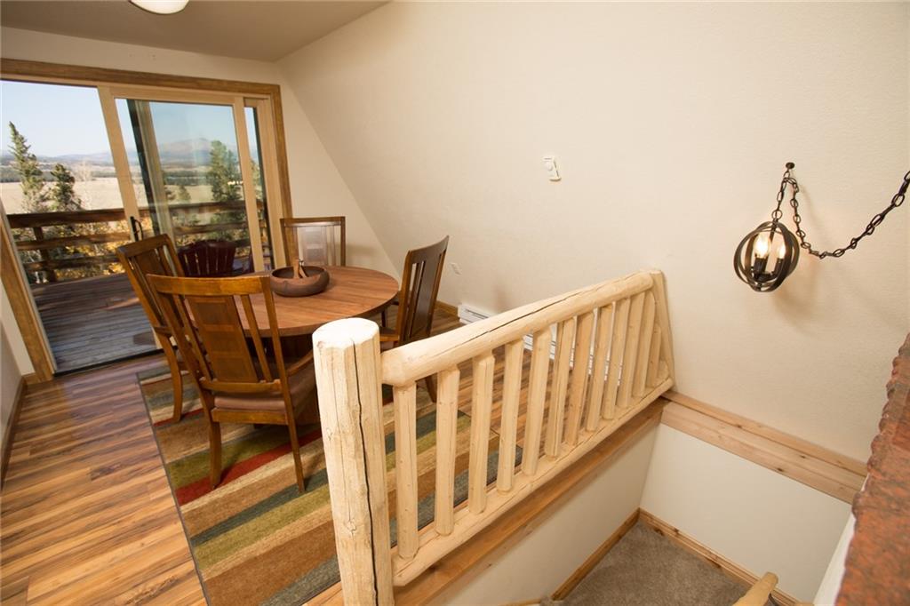 377 Sheep Ridge Road Fairplay, CO 80440 - Photo 22 of 35 a view of a dining room with furniture window and outside view
