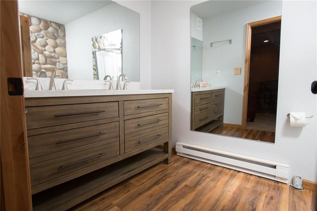 377 Sheep Ridge Road Fairplay, CO 80440 - Photo 25 of 35 a bathroom with a sink mirror and
