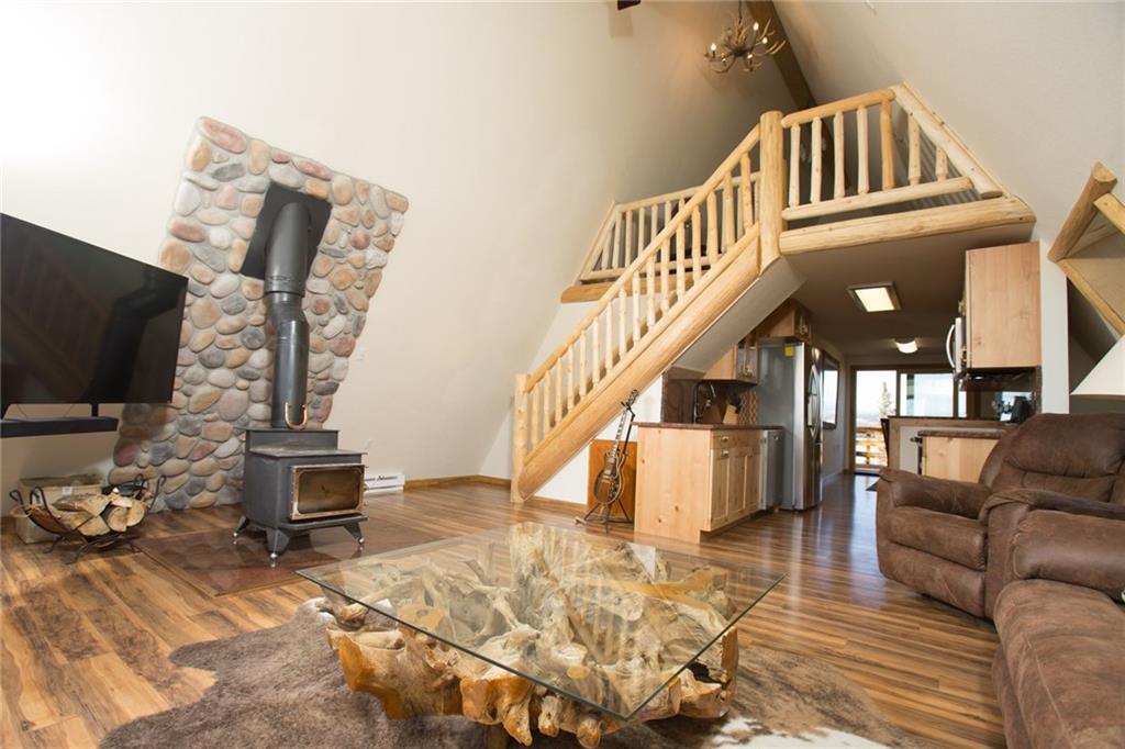377 Sheep Ridge Road Fairplay, CO 80440 - Photo 10 of 35 a view of entryway livingroom and hall with wooden floor