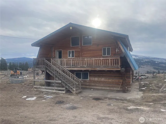 a view of balcony with wooden floor