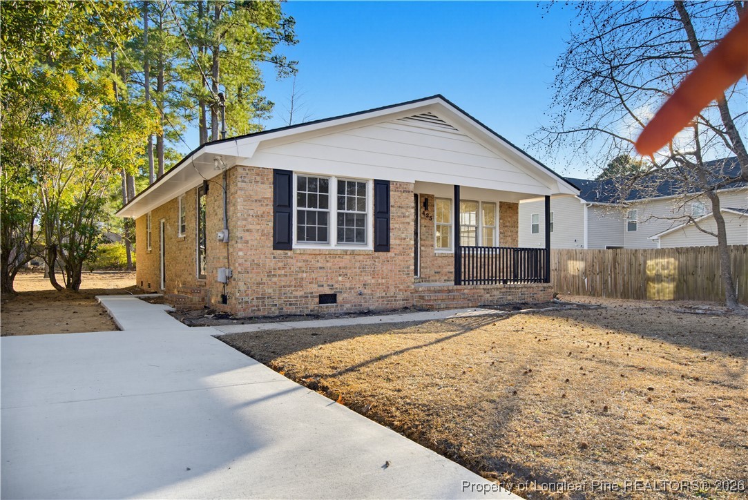425 Ralph Street Fayetteville, NC 28301 - Photo 2 of 36 a view of a house with snow on the road