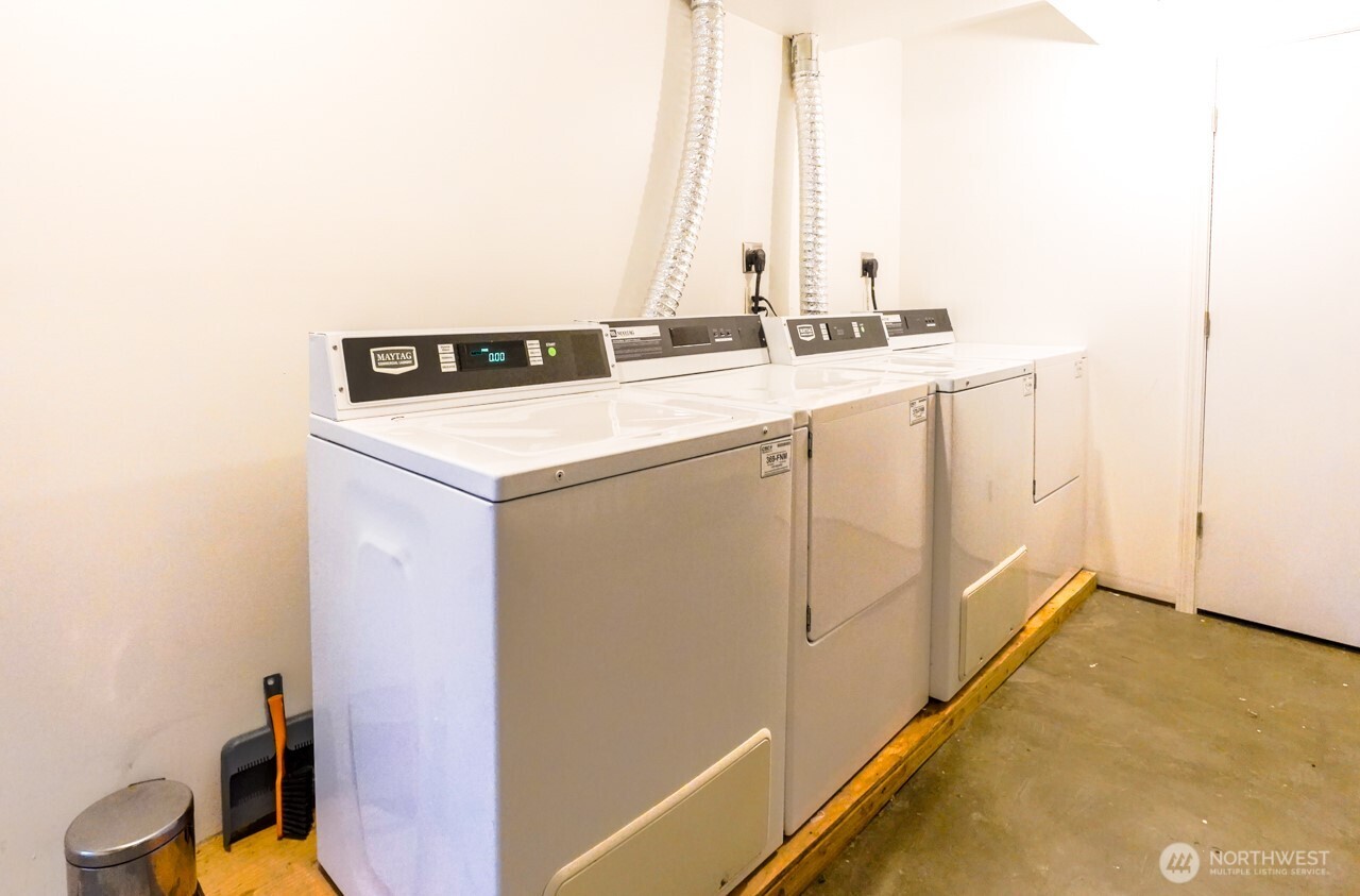 4027 Beach Drive Southwest, Unit 2 Seattle, WA 98116 - Photo 29 of 30 a utility room with dryer and washer