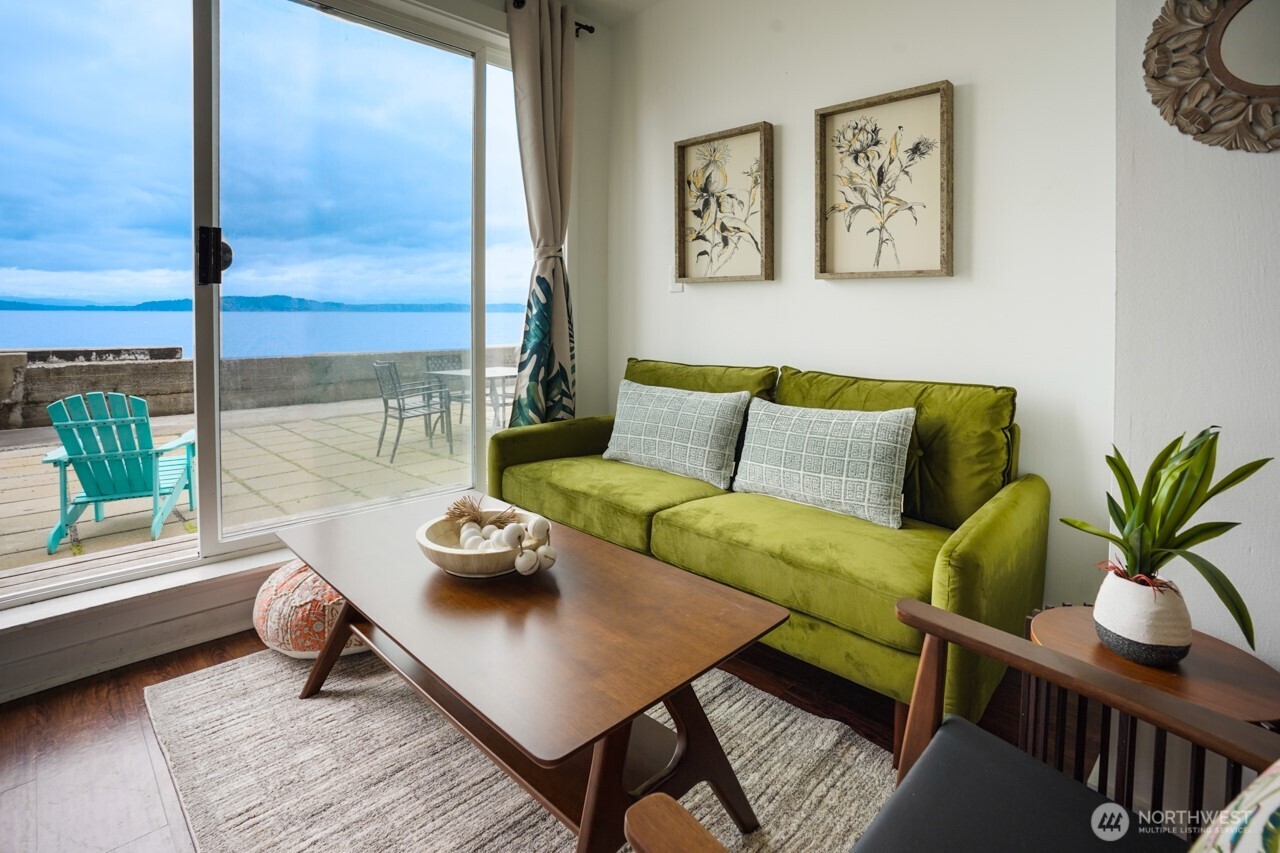 4027 Beach Drive Southwest, Unit 2 Seattle, WA 98116 - Photo 5 of 30 a living room with furniture and a window