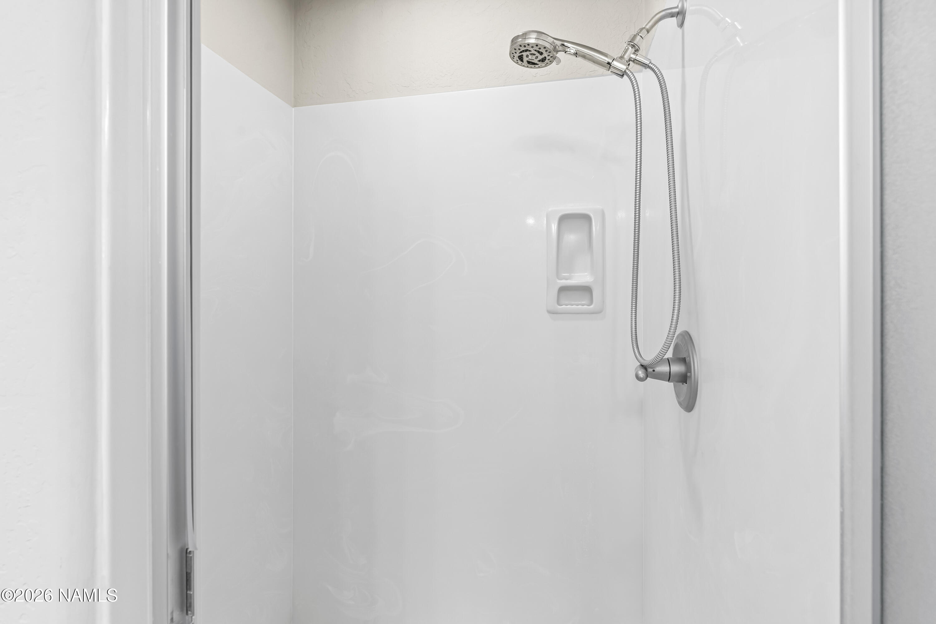 4860 West Quick Draw Flagstaff, AZ 86005 - Photo 15 of 32 a bathroom with a shower