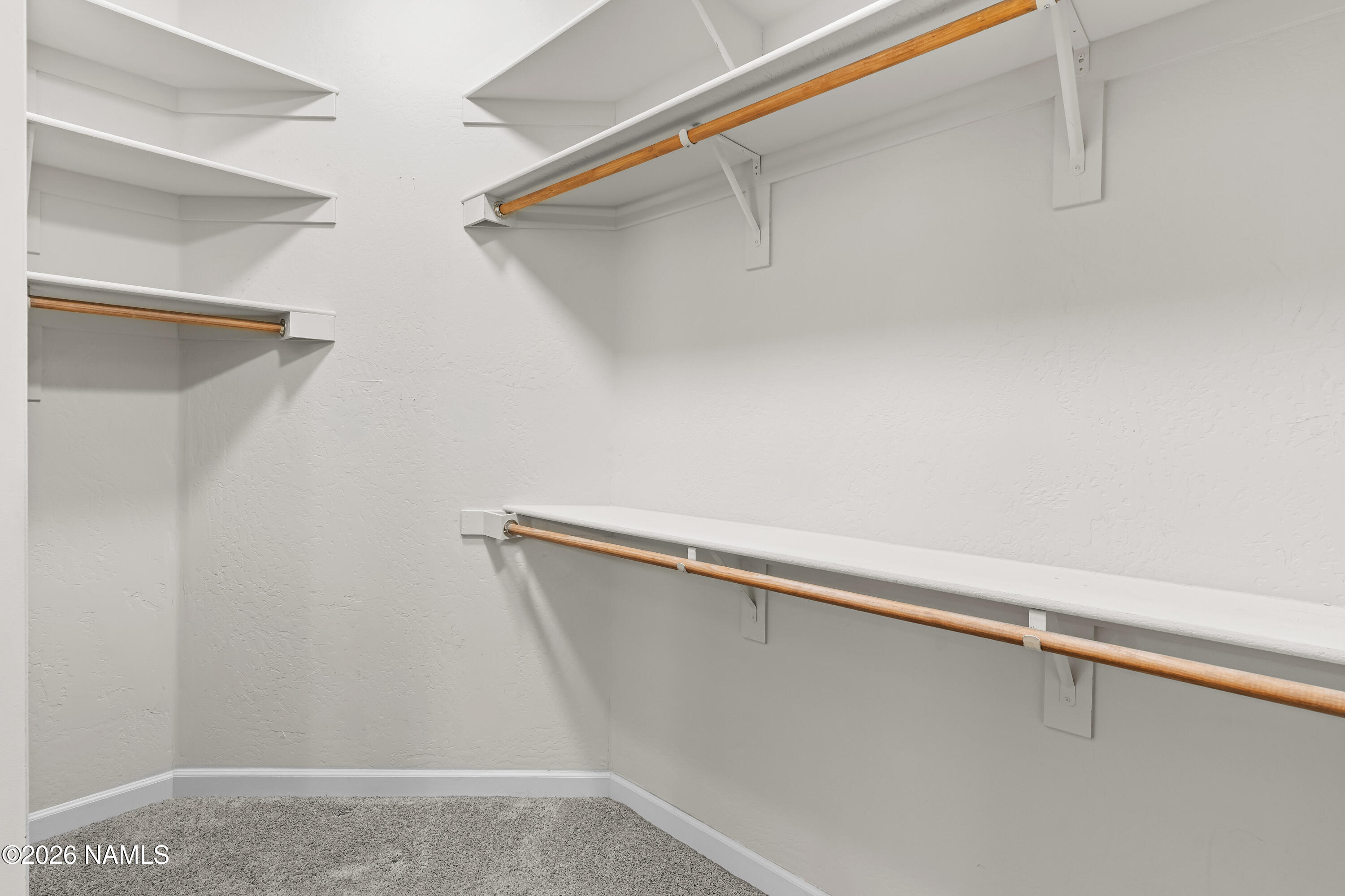 4860 West Quick Draw Flagstaff, AZ 86005 - Photo 17 of 32 a view of a room with racks on the wall